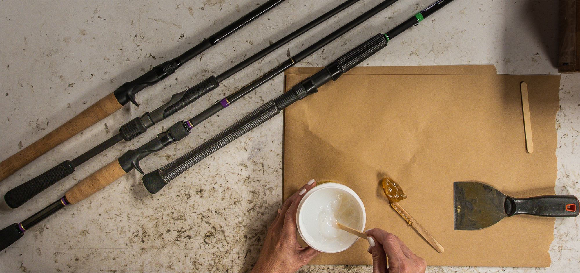 The building of custom fishing rods and custom built bass fishing rods. Four custom fishing rods with the handles being glued with two part epoxy.